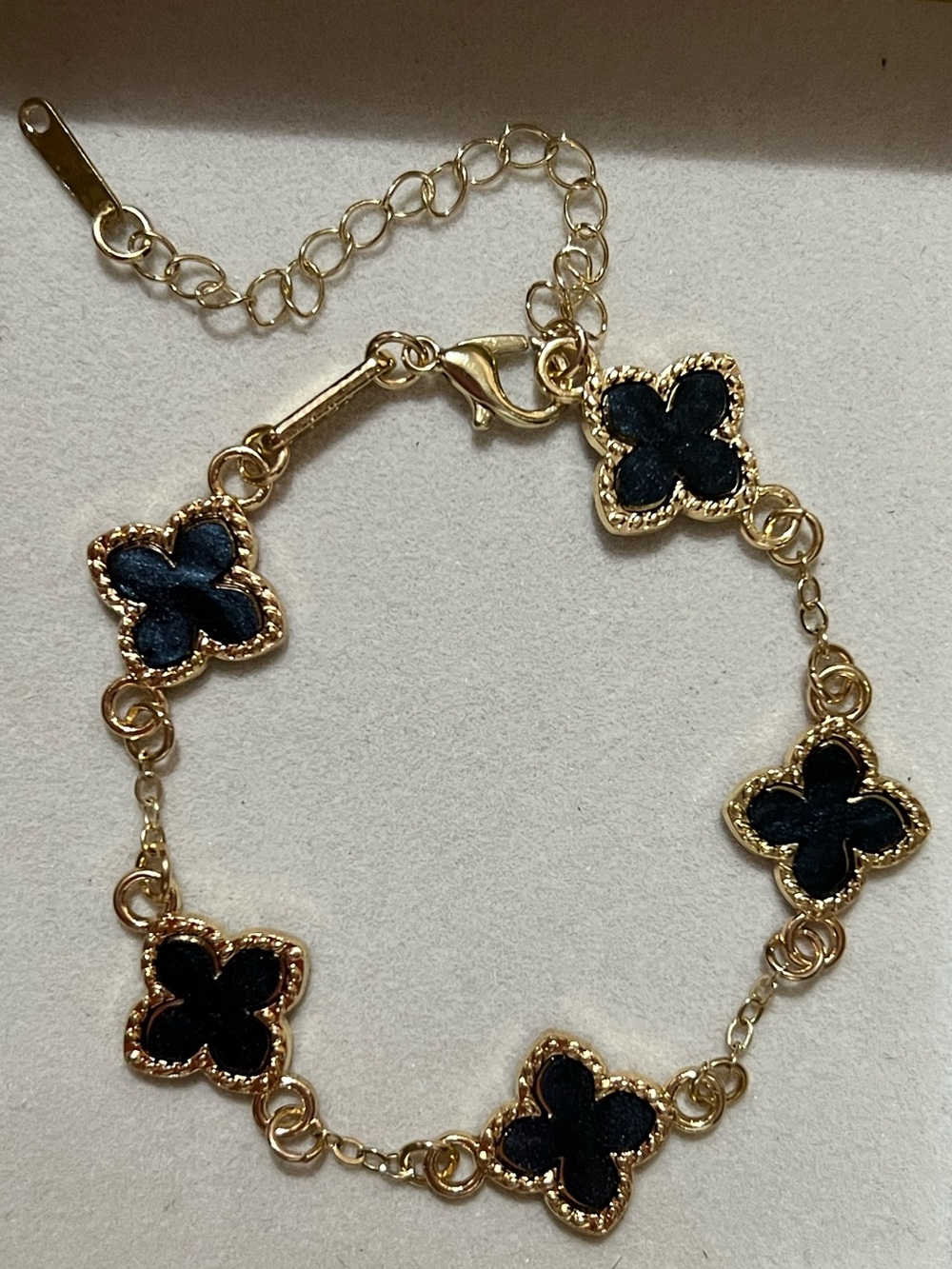 Gold-Tone Bracelet with Black Clover Motifs - Women's Jewelry